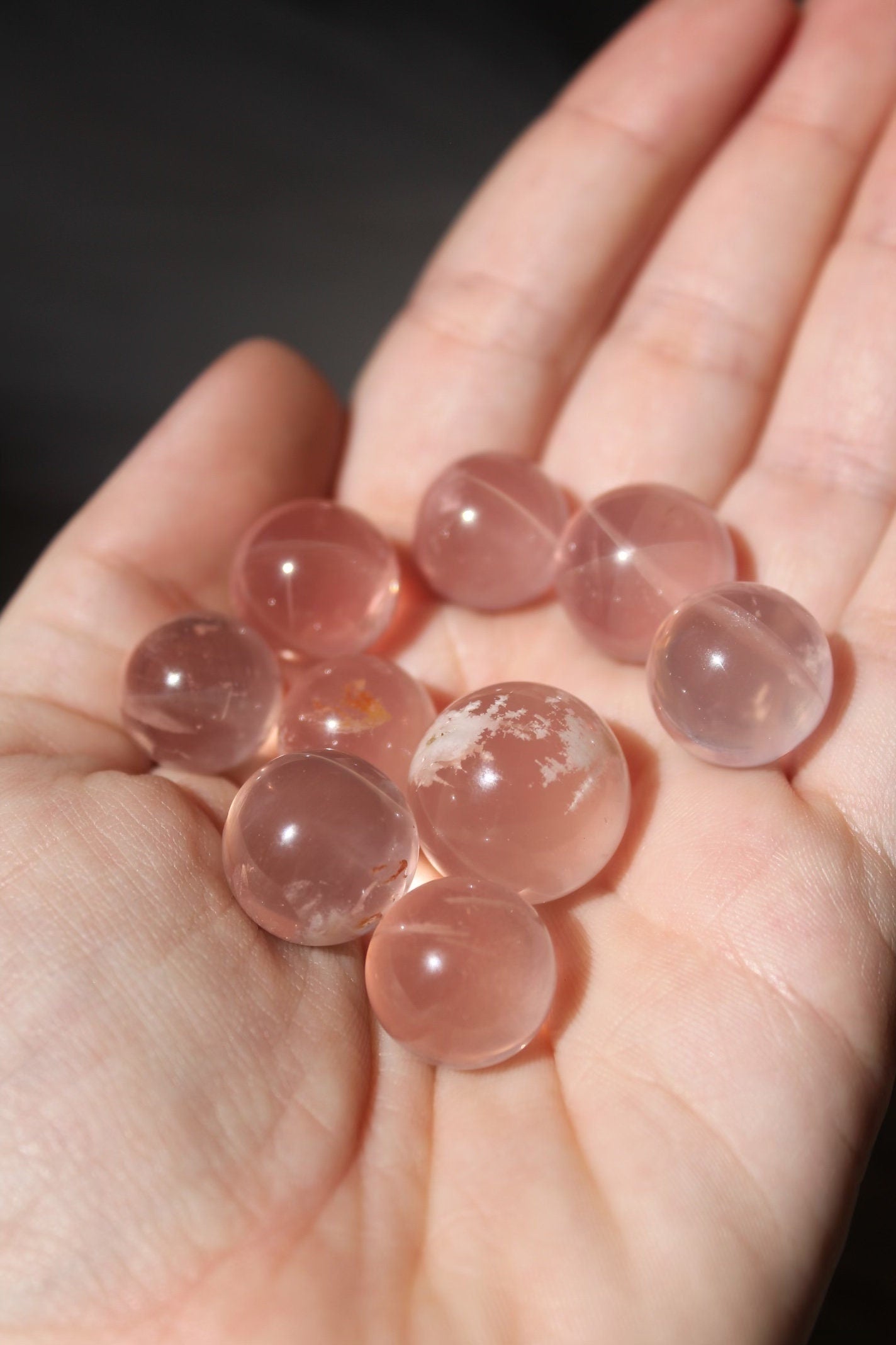 star flash rose quartz with snow garden inclusions mini sphere