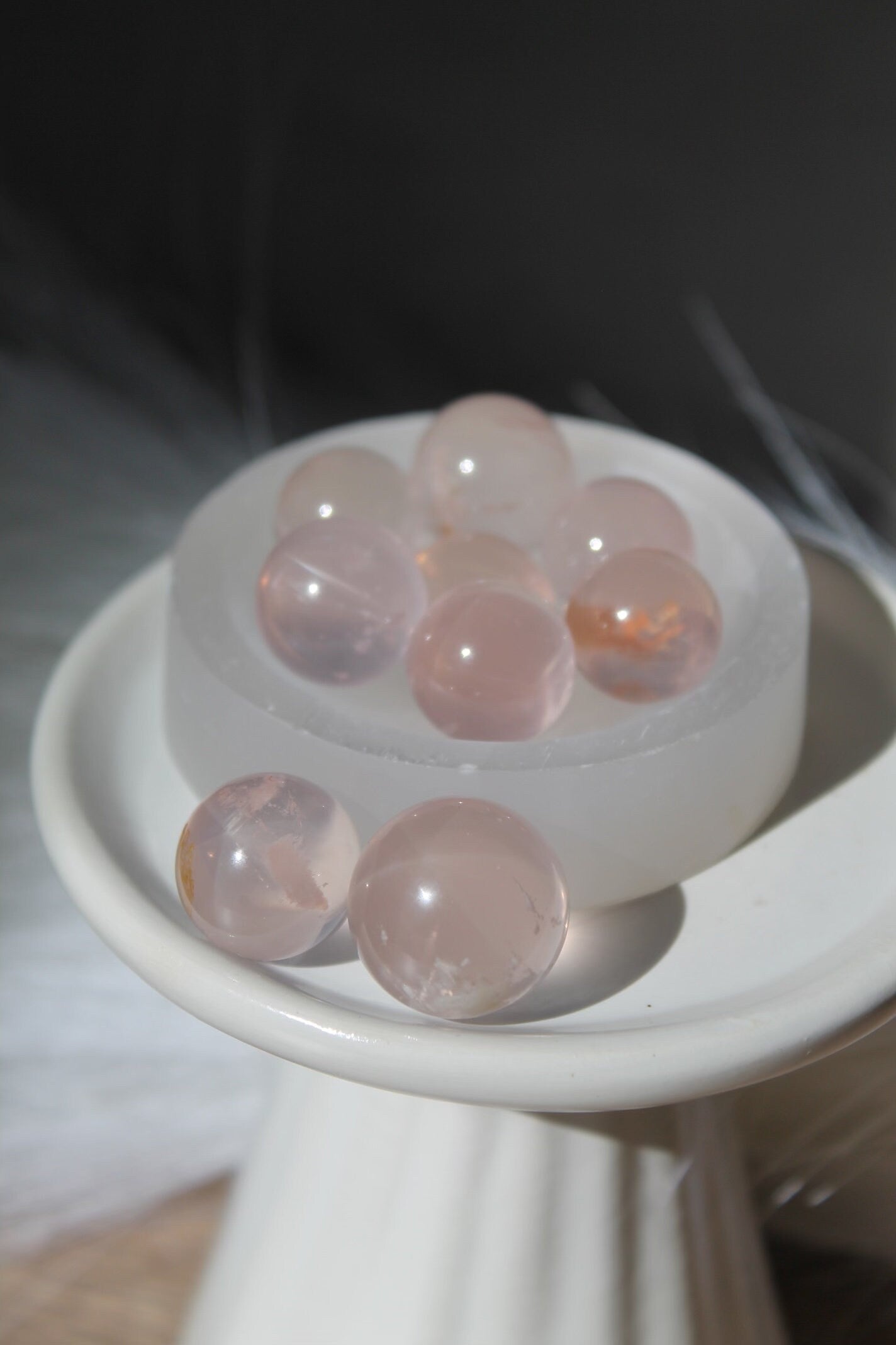 star flash rose quartz with snow garden inclusions mini sphere