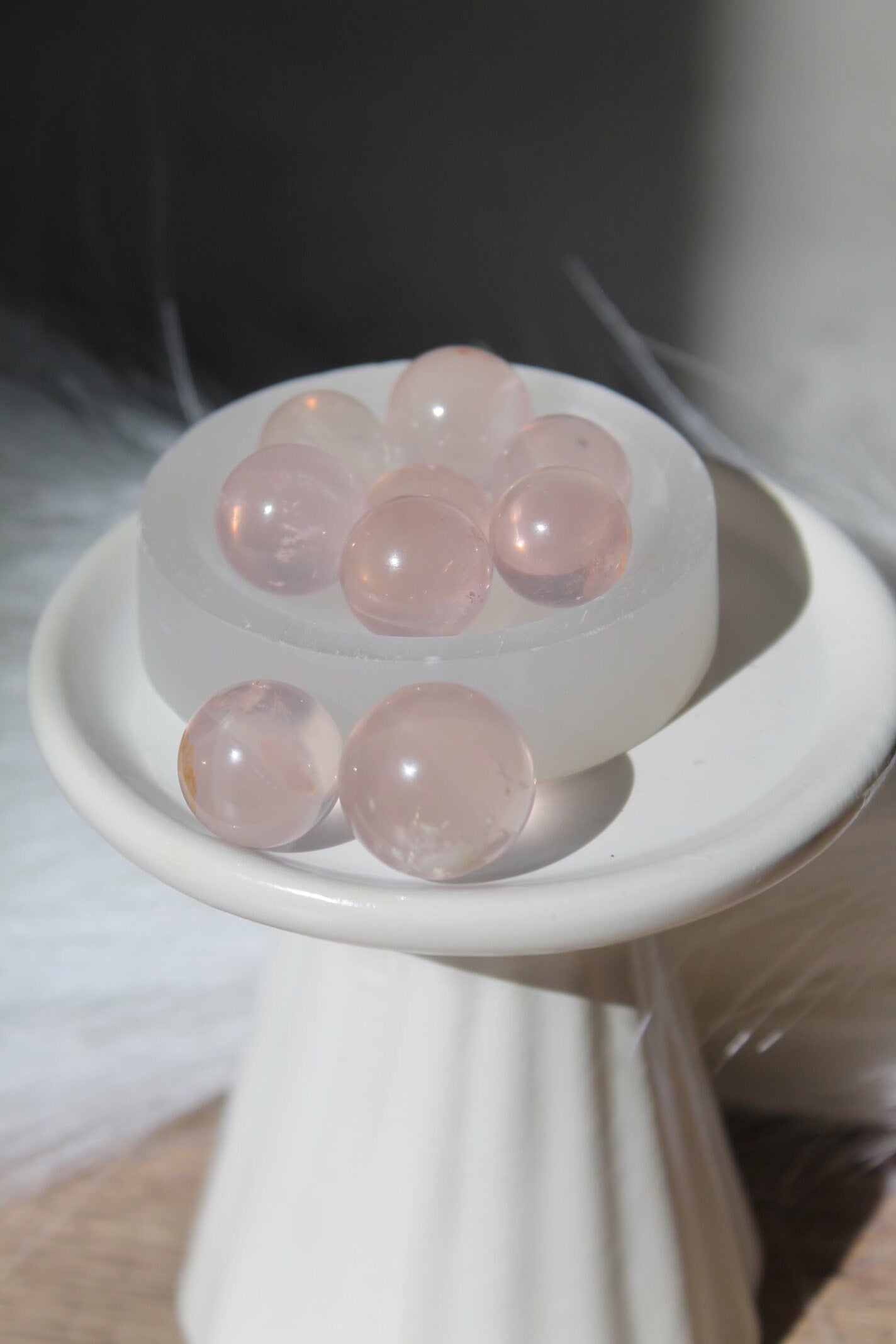 star flash rose quartz with snow garden inclusions mini sphere